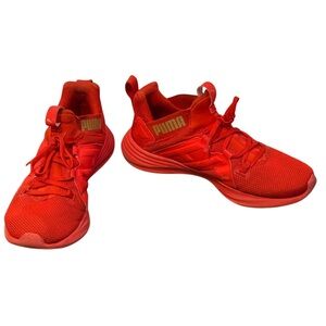 Puma Sneakers in Red w/ gold accents, Size:8.5 great condition, gently used